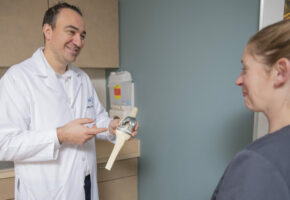 joint replacement doctor with patient